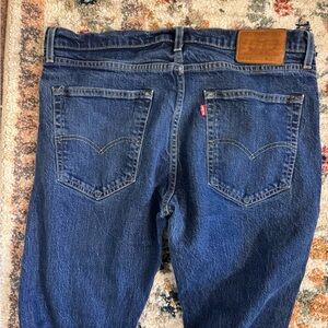 Levi's Men's Slim Straight Jeans in Dark Blue with Brown Patch